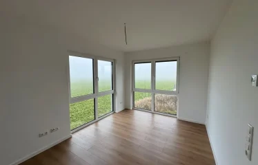 Moderne Neubau-Doppelhaushälfte in Heemsen mit Einbauküche